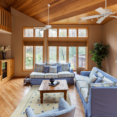 Rustic living room with blue sofas